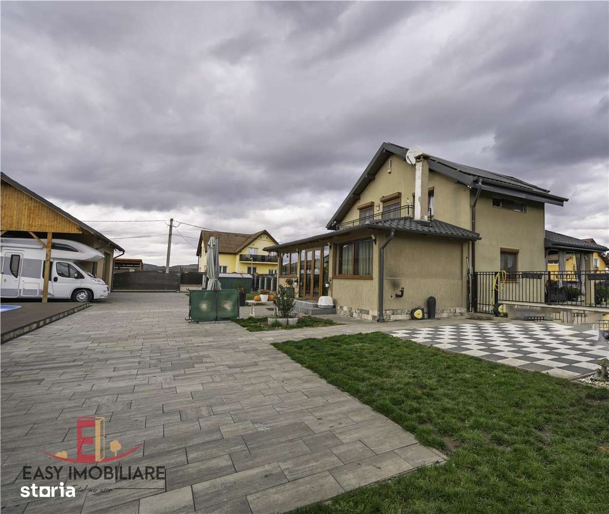 Casa moderna cu piscina, panouri solare, pompa caldura si teren de 140 - Imagine principală: 4/19