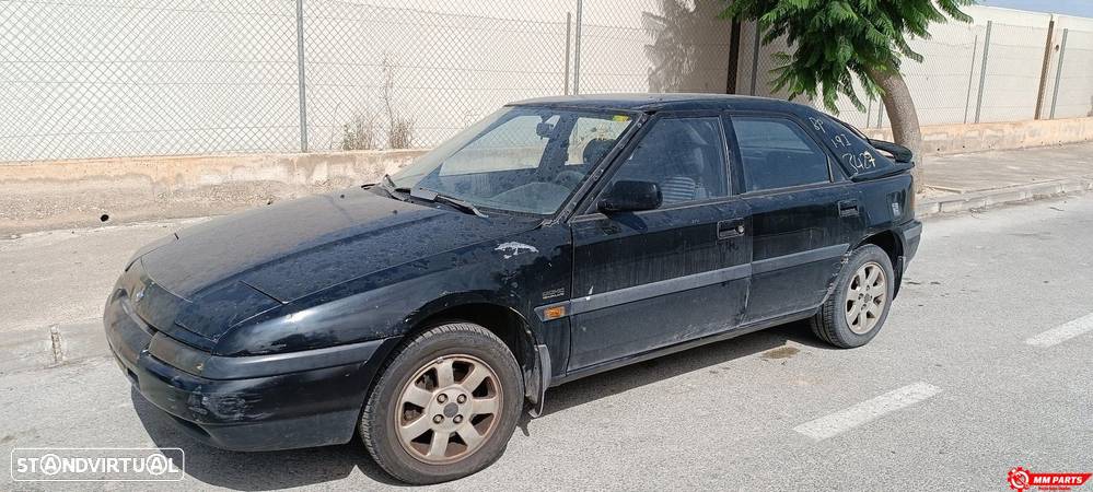 FECHADURA PORTA FRENTE ESQUERDA MAZDA 323 C IV - 1