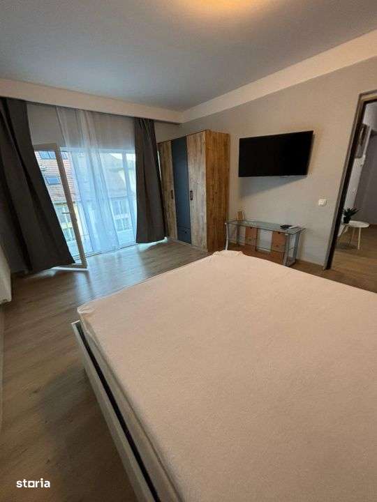 Apartament spatios cu 2 camere • Complet mobilat  • Garaj  • Flo-5