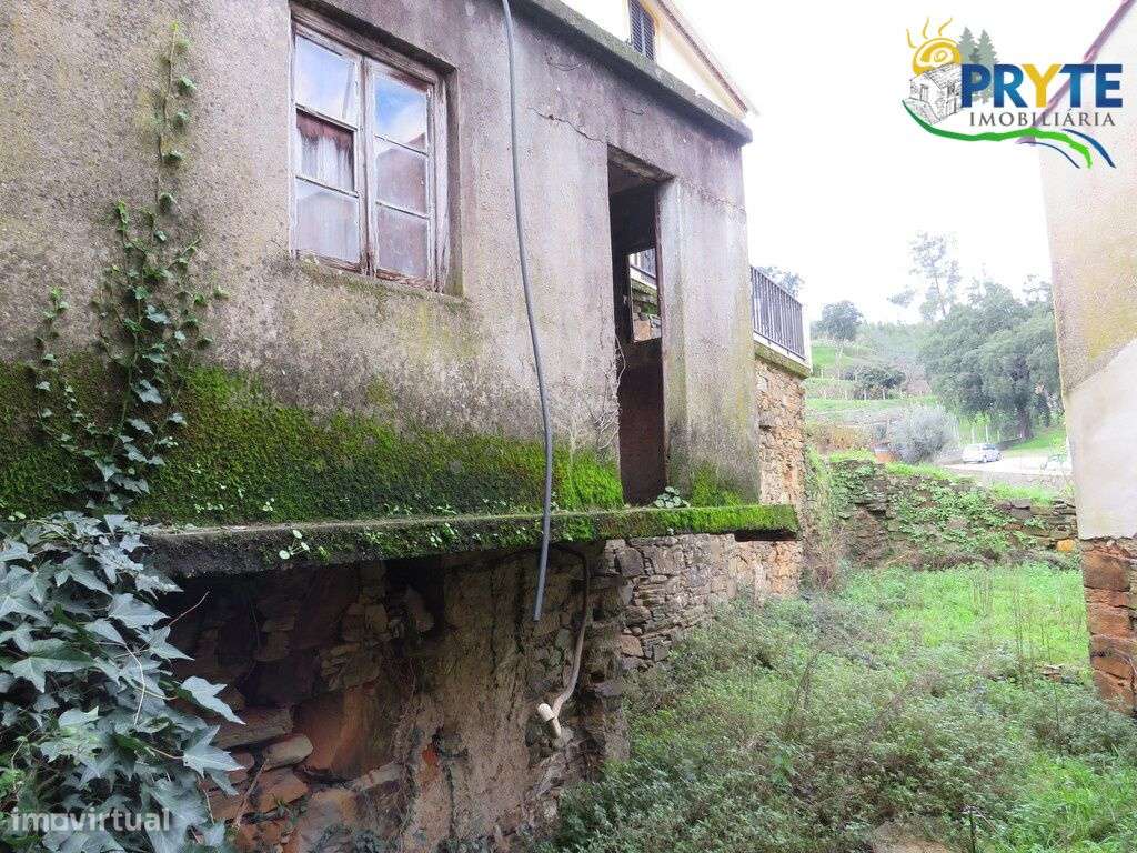 Moradia T6 com três pisos em alvenaria de pedra de xisto - Grande imagem: 5/22