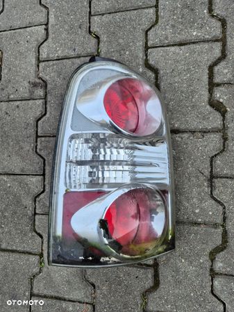 LAMPA LEWA TYŁ EU HYUNDAI TRAJET 2.0 CRDI LIFT - 1