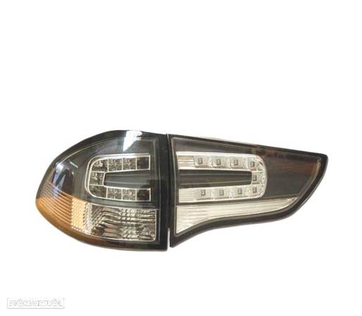 FAROLINS PARA MITSUBISHI MONTERO SPORT 09 LED PRETO - 2