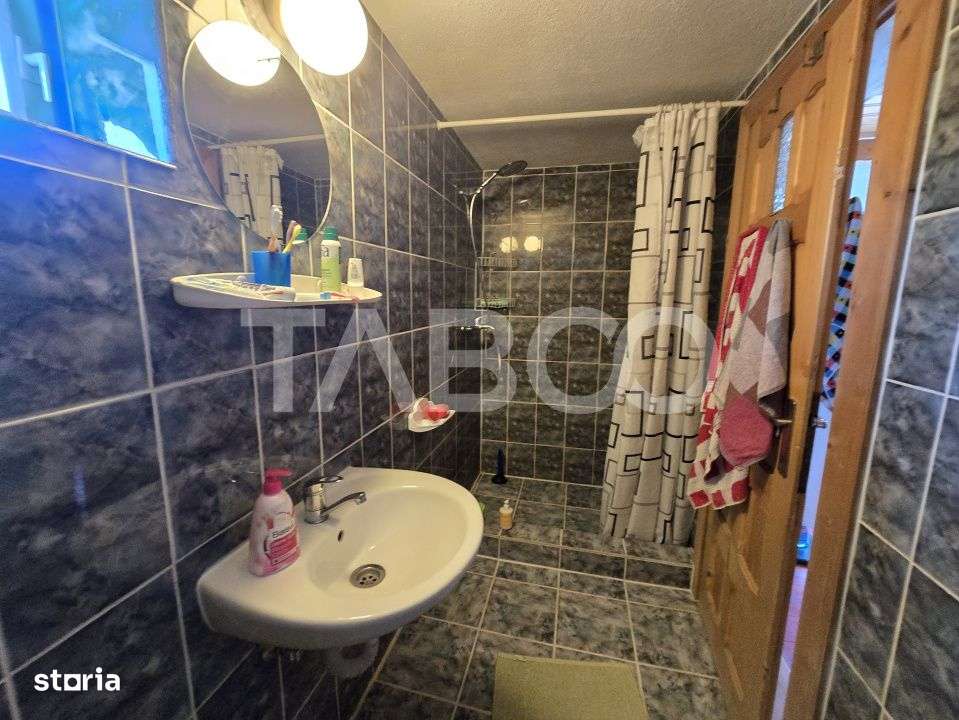 Casa de vanzare 3 camere 107 mp construiti 900 mp teren in Tocile-14