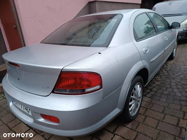 Chrysler Sebring 2 II części wnętrza Schowek Podłokietnik Tunel środkowy Gałka dźwignia biegów hamulca ręcznego - 3