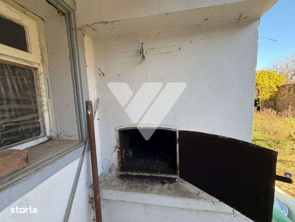 Casa 54 mp in Cristian cu teren de 1400 mp in renovare - Imagine principală: 5/10