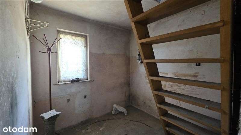 Połowa domu do remontu, duży potencjał.-12