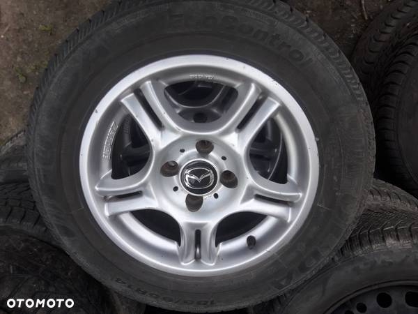 Toyota Yaris Aygo Corolla Mazda 323f Alufelgi z oponami 14c 5x114,3 - 7