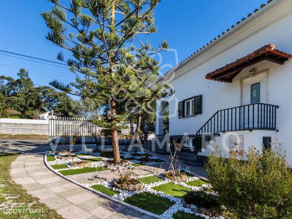 Moradia térrea T2 e T1, com garagem, jardim, furo e terreno-5