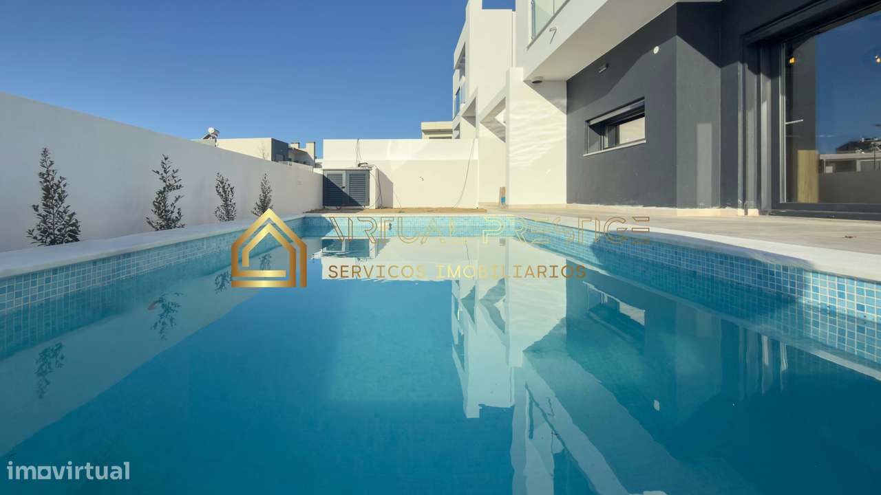 Moradia T4 moderna na Charneca da Caparica com piscina, jardim e ga...-27