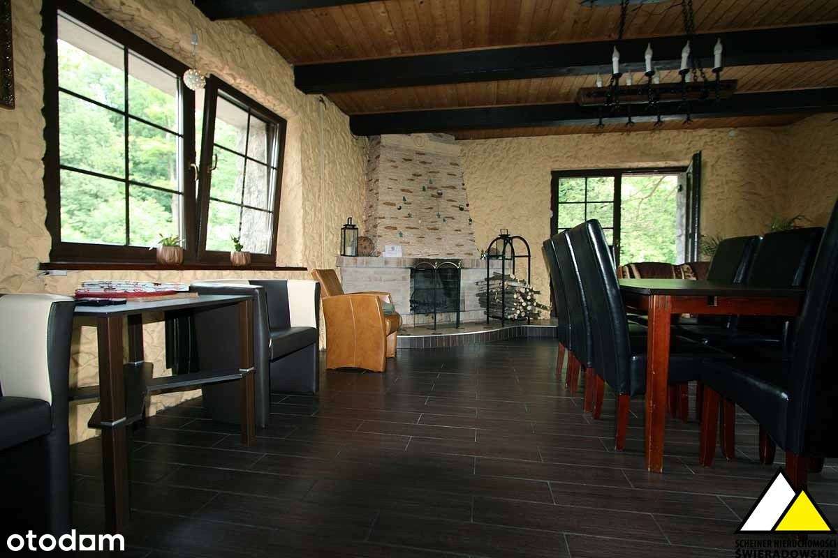 Dom z pokojami do wynajęcia i sklepem.-12