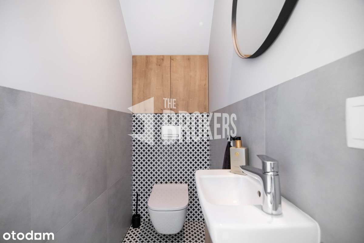 Pięknie wykończony segment z ogrodem i garażem.-3