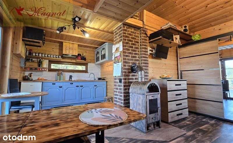 Atrakcyjny dom drewniany całoroczny na dużej dział-10