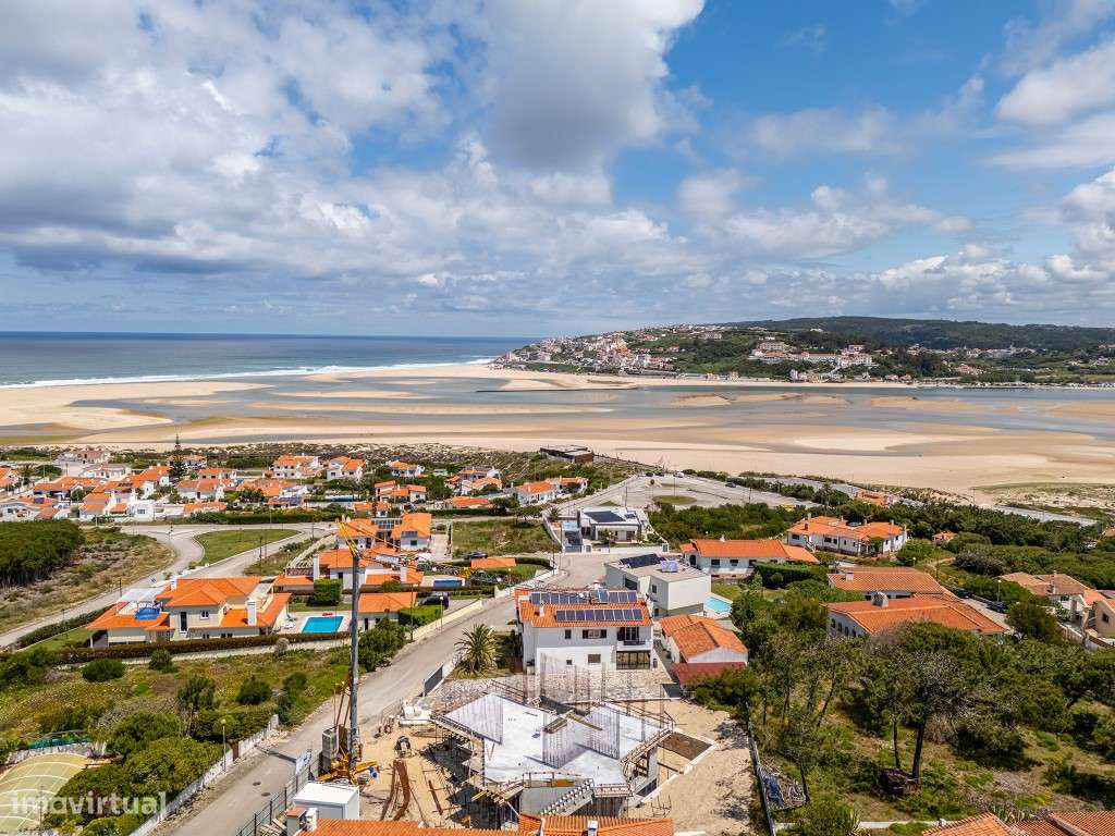 Moradia vista lagoa, praia e mar perto de vários campos de golfe - Grande imagem: 4/19