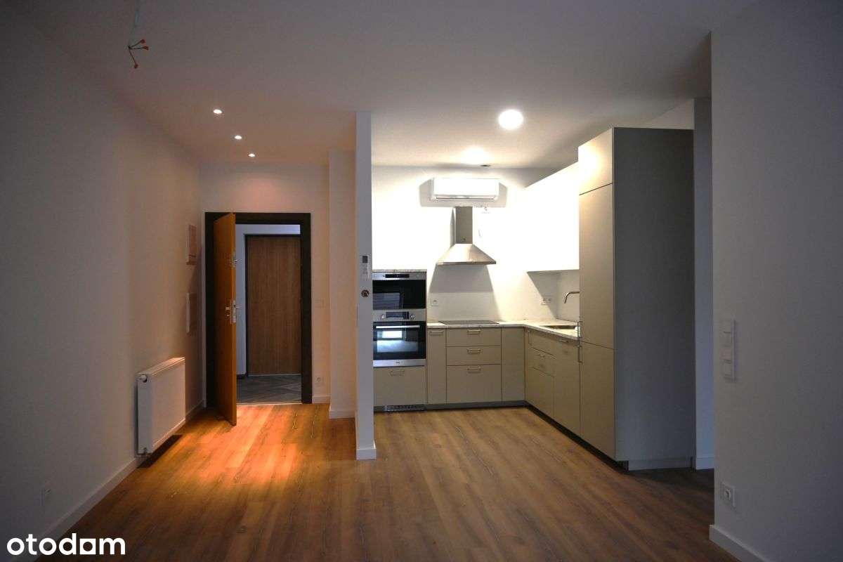 Nowe mieszkanie z miejscem postojowym.-1