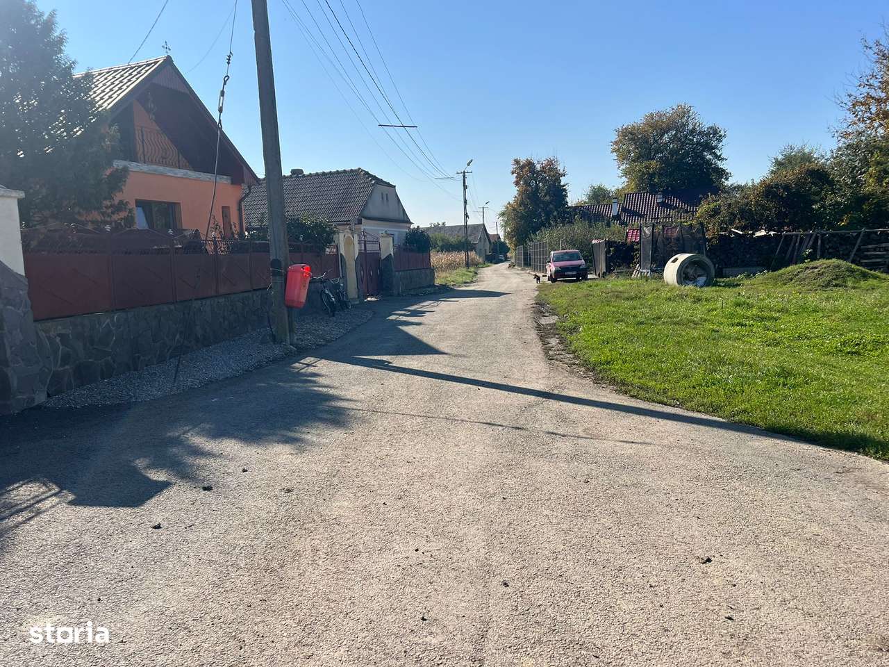 Teren intre case,la asfalt,curent,canalizare,apa,iluminat stradal.-3