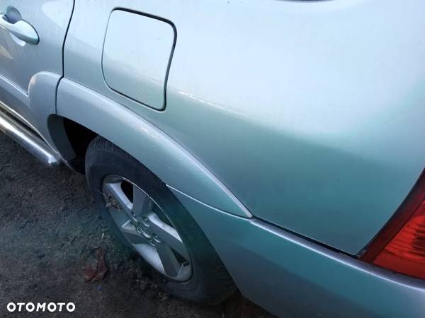 Listwa nakładka tył lewa MAZDA TRIBUTE 2,3 benz.110KW - 1