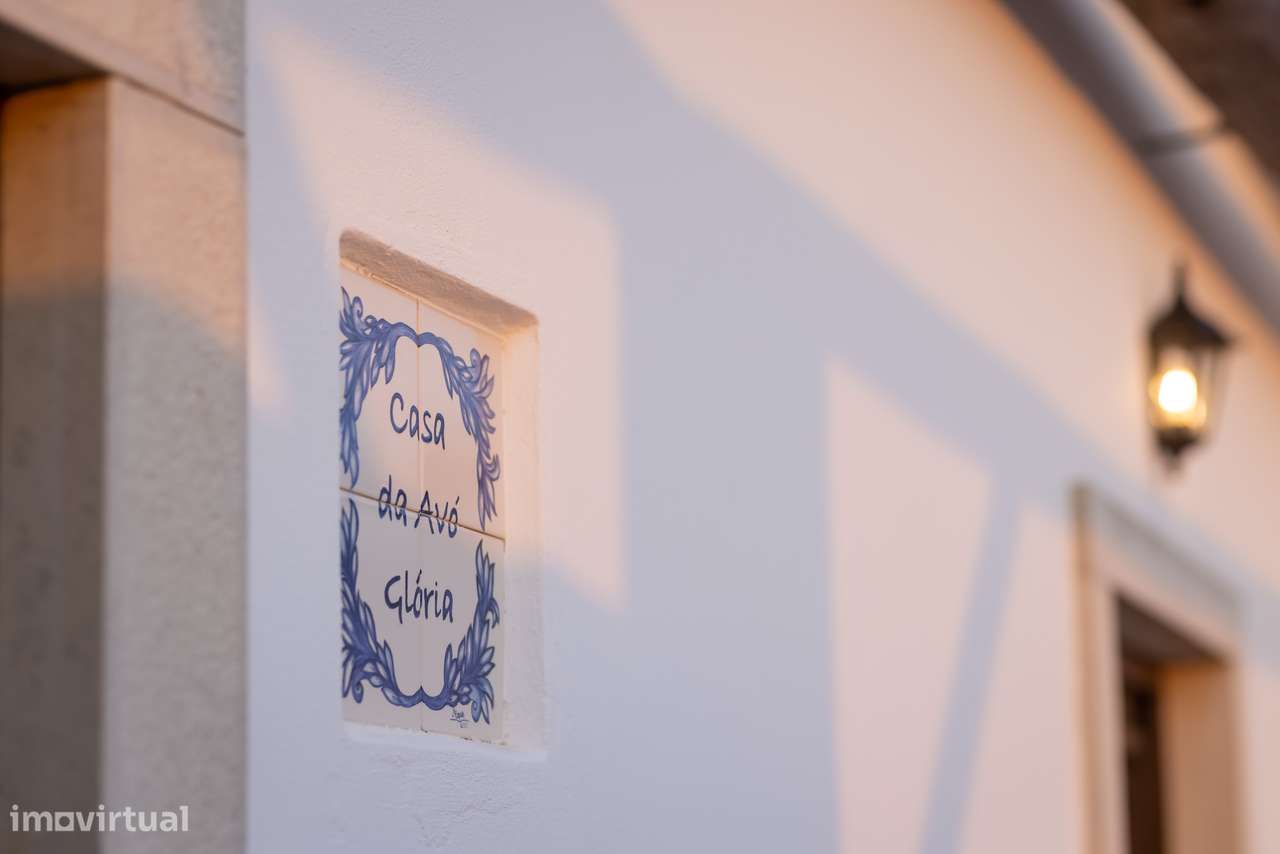 Moradia T-1 com logradouro, piscina, estacionamento.-17