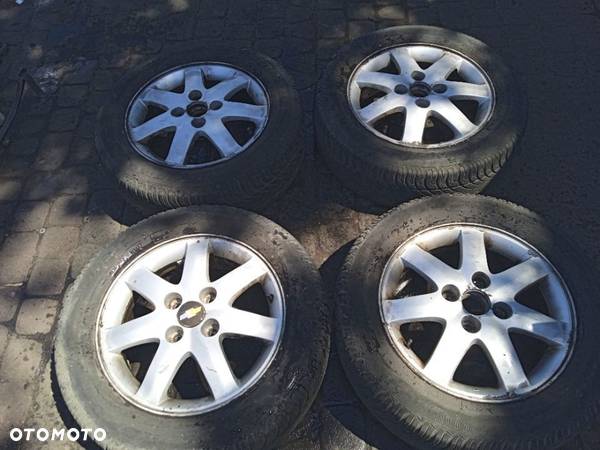 KOMPLET FELG Z OPONAMI ZIMOWYMI EVANDA NUBIRA LACETTI SUZUKI ALTO SWIFT 4x114,3 ET40 16' - 1