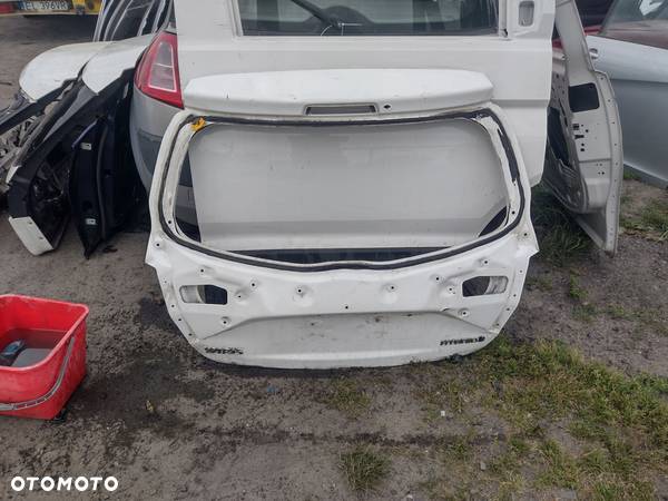 KLAPA TYŁ BAGAZNIKA TOYOTA YARIS BIAŁA WGNIOTKA - 1