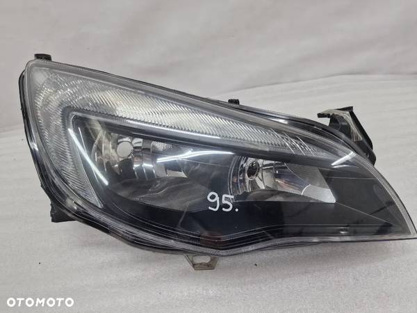 OPEL ASTRA IV 4 J LIFT 12- CIEMNA ZWYKŁA PRAWA LAMPA PRZEDNIA PRZÓD , NR 13371596 , NR AUKCJI LL95 - 1