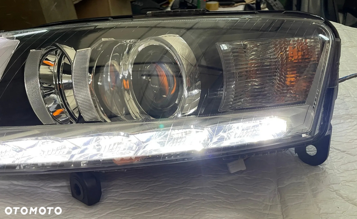 Audi A6 C6 4F Lift reflektor lewy lampa bi xenon nieskrętna nowa oryginał - 3