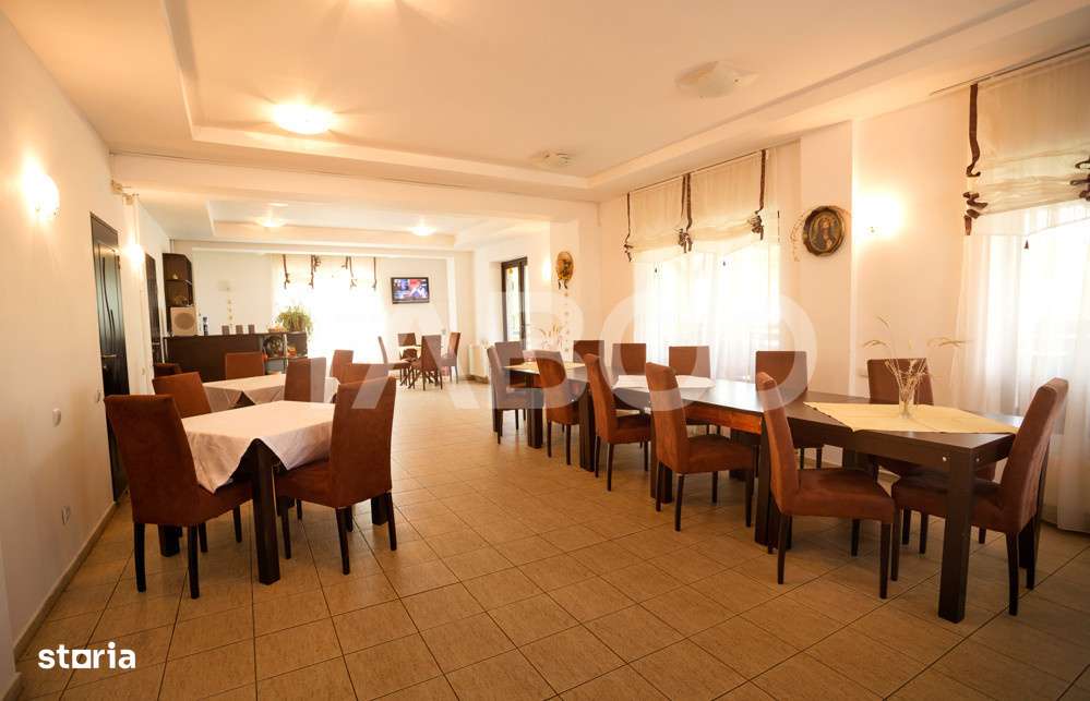 Pensiune 13 camere 16 bai sauna piscina si teren 1565 mp Cisnadioara - Imagine principală: 4/19