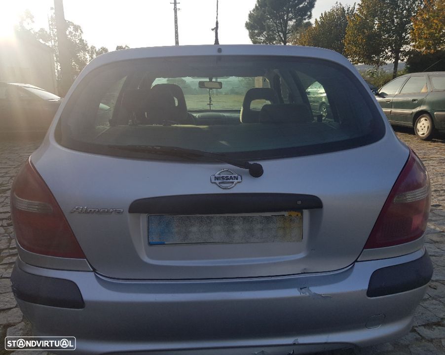 Peça - Tampa Mala Nissan Almera 2001