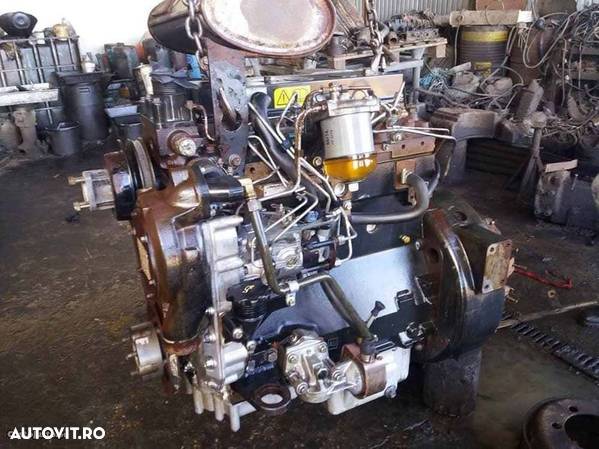 Motor second hand buldoescavator komatsu wb97 ult-026261 - 1