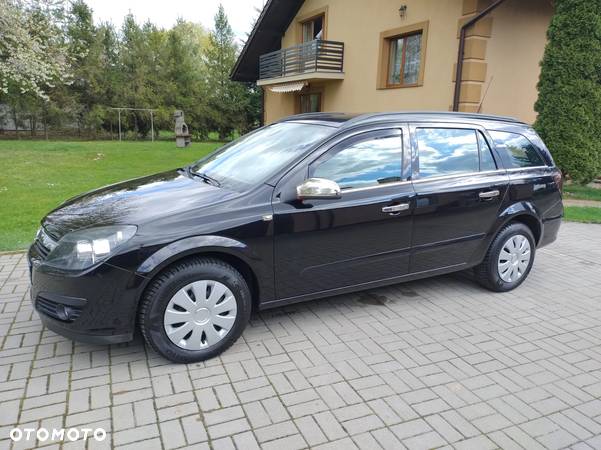 Opel Astra 1.8 Caravan Edition - 13