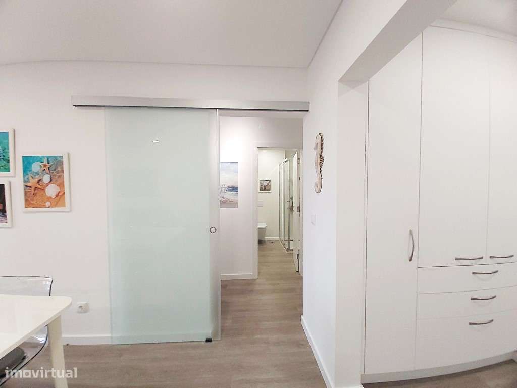 T2 remodelado em condomínio com piscina e campo de ténis-50