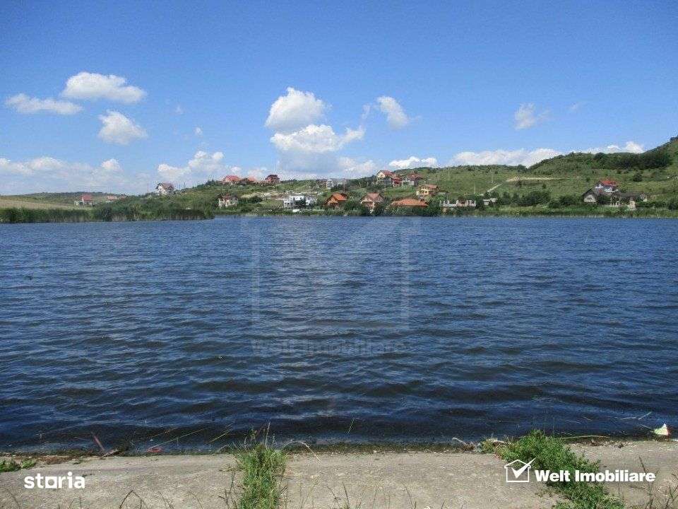 Teren Chinteni - deasupra lacului, 751 mp, front 22.6 m - Imagine principală: 3/4
