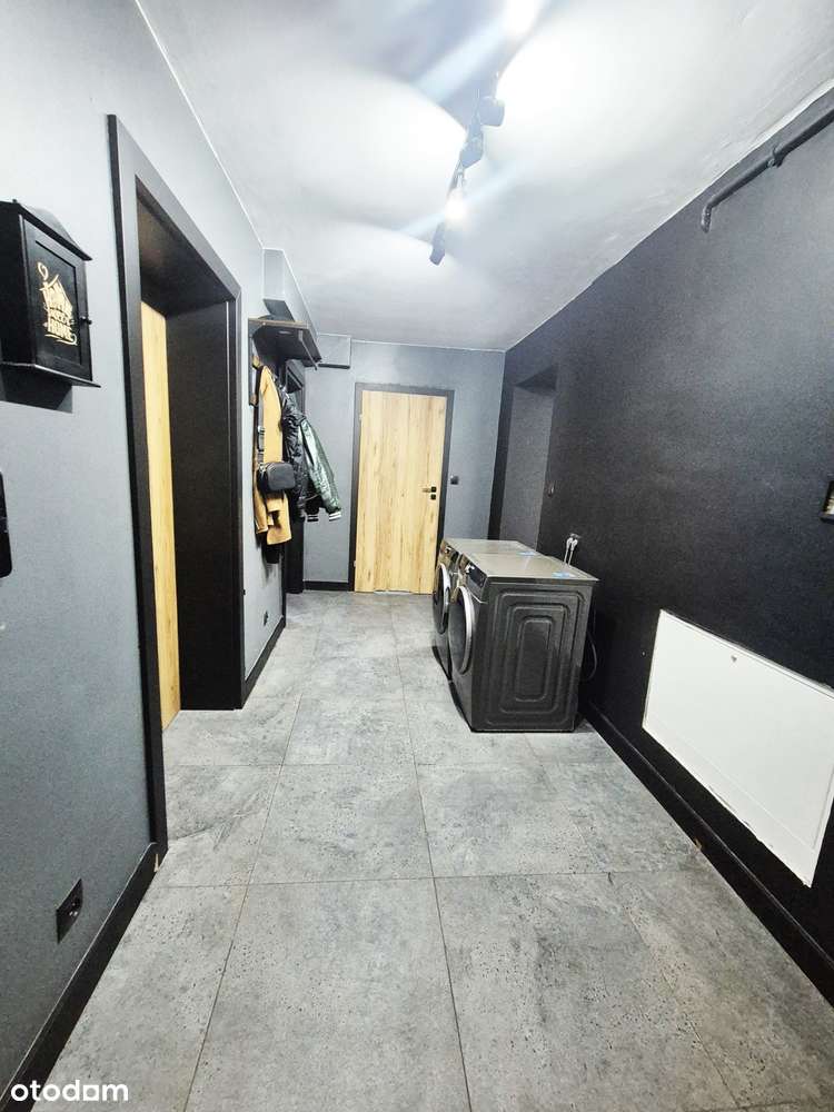 Duże mieszkanie na parterze z dwoma miejscami parkingowymi na własność-8