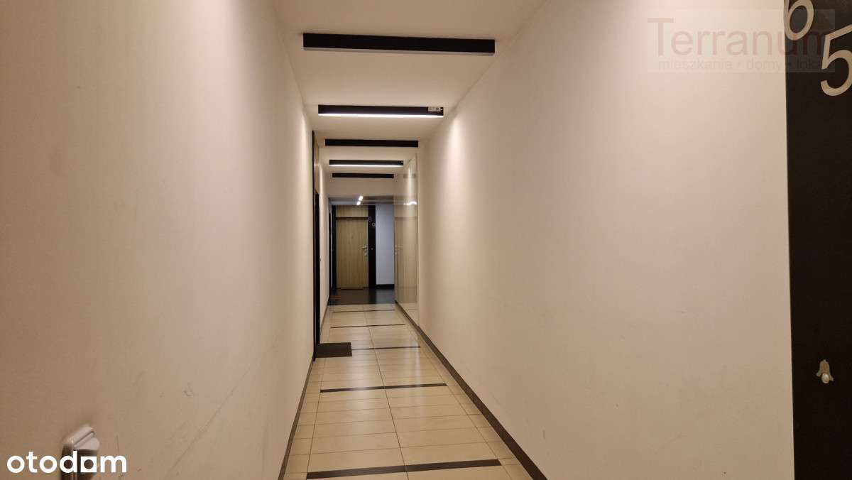 3 pokoje z miejscem postojowym Garażowa-13