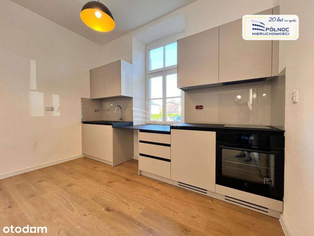 Dwupoziomowe mieszkanie na zamojskich Koszarach - Pełny obrazek: 1/11