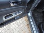 Volkswagen Passat 1.9 TDI Comfortline - 26