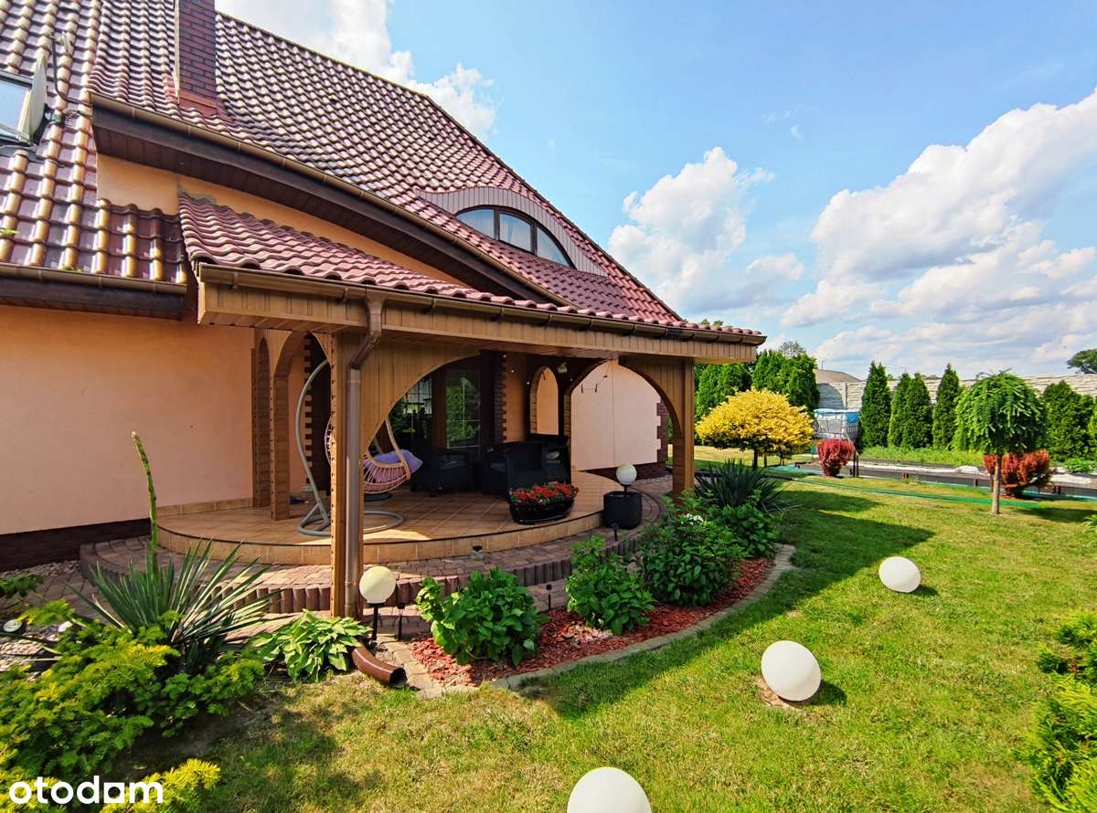 Oszczędny w eksploatacji dom, dwa garaże, duża zagospodarowana działka-4