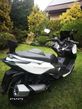 Kymco Xciting - 12