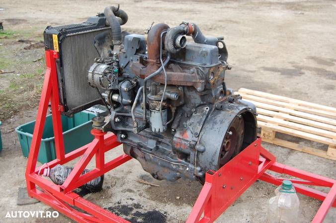 Motor buldoexcavator NEW HOLLAND - FIAT HITACHI - 4