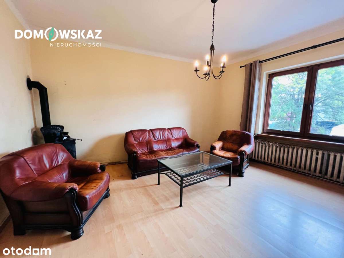 Dom z działką 699m² i potencjałem inwestycyjnym!-4