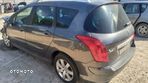 PEUGEOT 308 SW zacisk lewy prawy tyl - 2