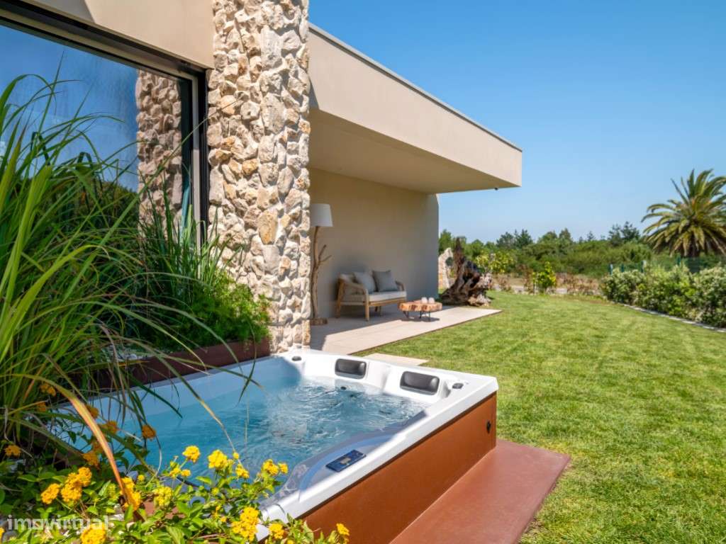 Moradia de extraordinária qualidade junto à lagoa, golfe e praia-26