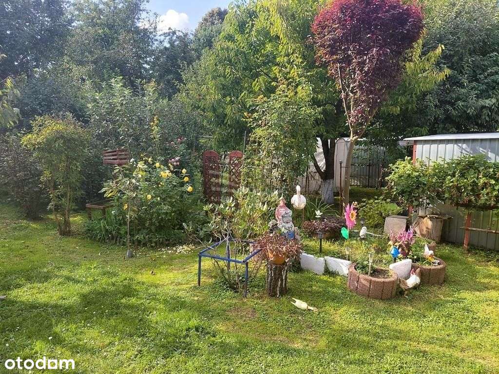 Mieszkanie dwupoziomowe z ogrodem i garażem-18