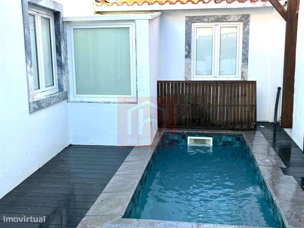 Moradia térrea T2 com logradouro e piscina em Alcochete.-3