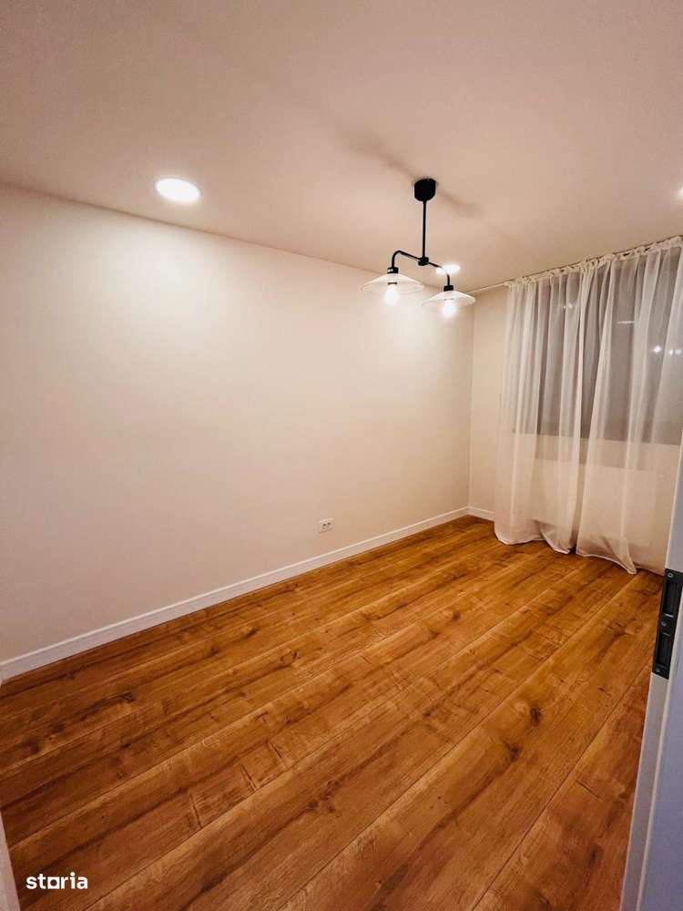 Apartament cu 3 camere, balcon și vedere urbană - Imagine principală: 5/11