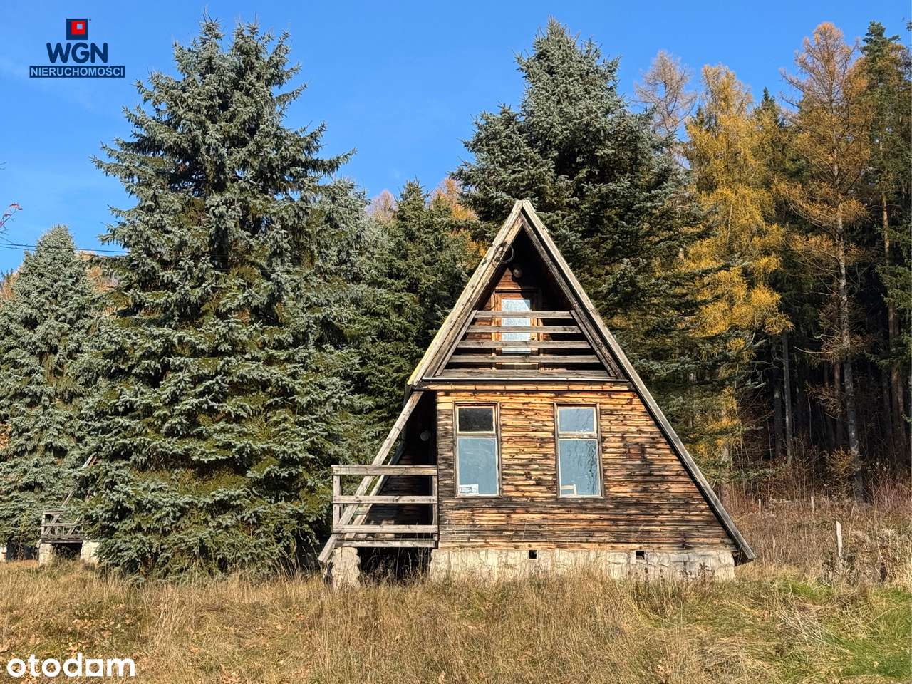 Grunt zabudowany 10-ma domkami nad jeziorem - na sprzedaż.-16