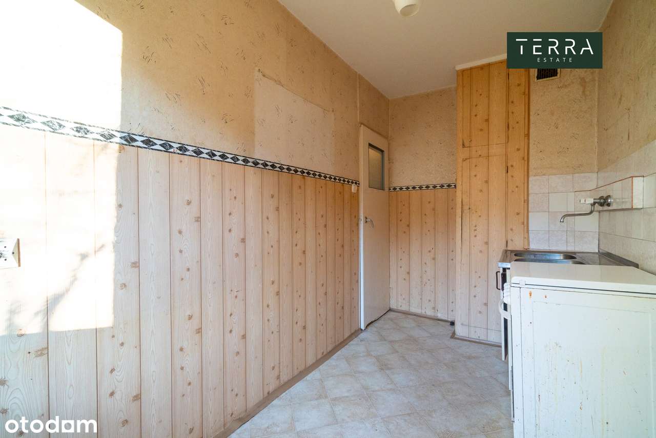 Dwupokojowe mieszkanie do remontu na parterze z balkonem i ogródkiem-5