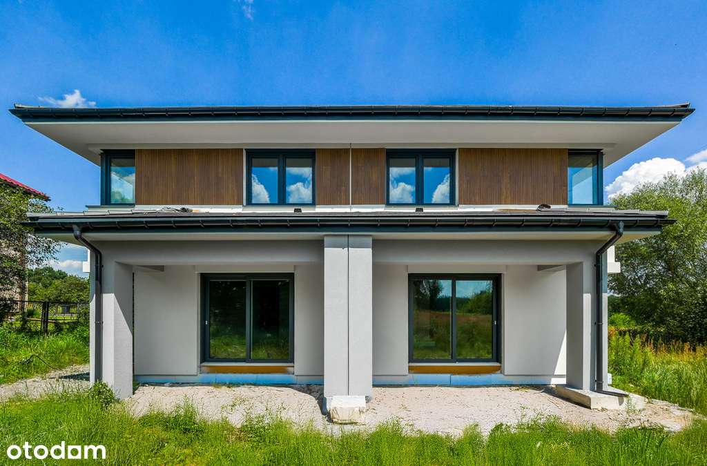 Bliźniak z dużym ogrodem w sąsiedztwie lasu-1