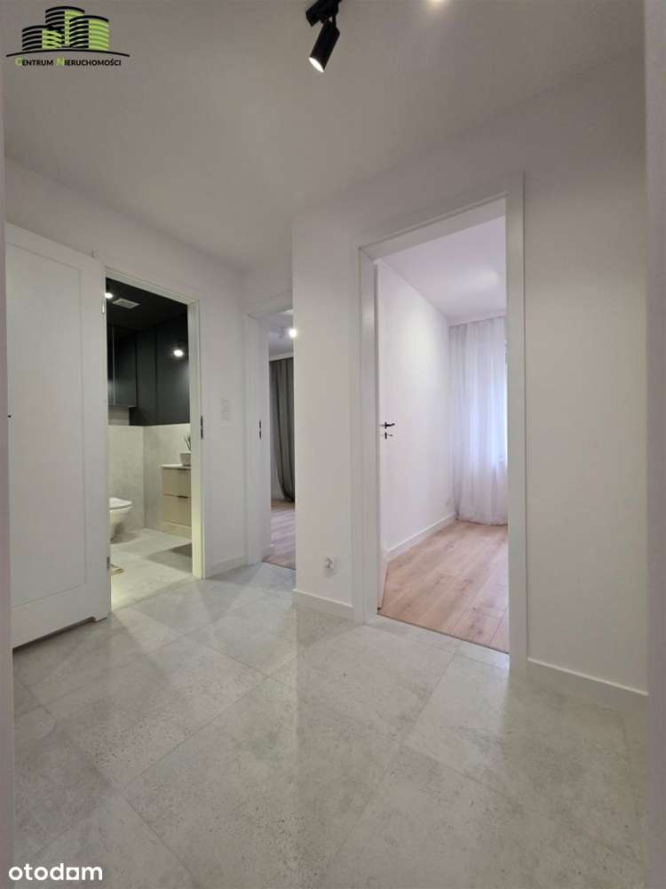 4 pokojowe mieszkanie na poszukiwanym 2 pietrze.-6