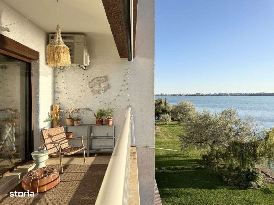 Locuinta aparte cu terasa si apusuri pe lac - Imagine principală: 1/19