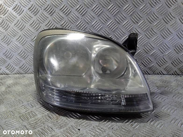 LAMPA PRAWA PRZEDNIA NISSAN ALMERA TINO - 1